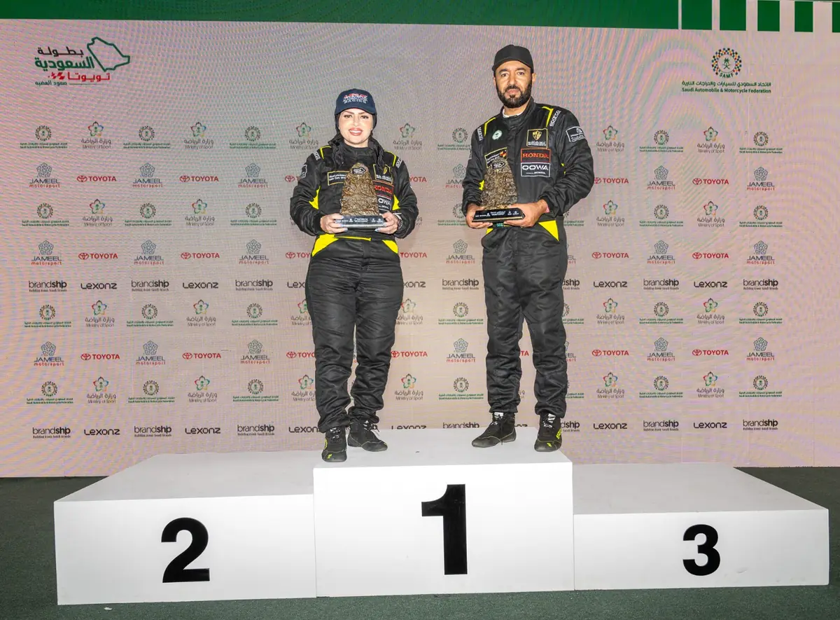Honda Racing Saudi Arabia team celebrating podium finishes at the Saudi Toyota Hill Climb Championship 2026 in Taif